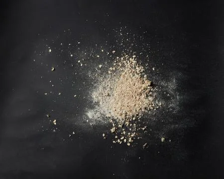 Sprinkled flour over background Fotos de archivo