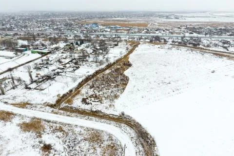Sprinkled with snow grain elevator. Winter view of the old Soviet elevator. W Stock Photos