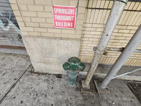 Sprinkler-03-hydrant-pipe-corner Stock Photos