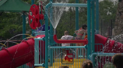 Sprinkler Fun at Community Pool (1 of 2) Stock Footage 32625837