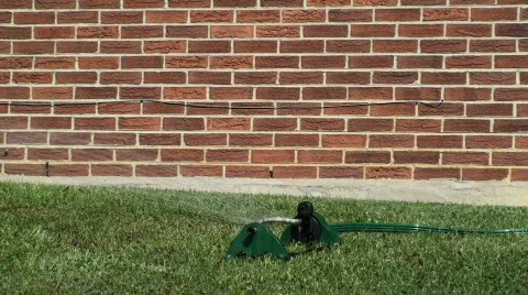 Sprinkler in grass Stock Footage 694237