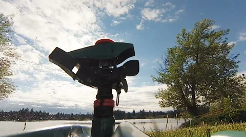 Sprinkler Head on the Lake Stock Footage 67255257