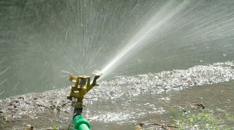 Sprinkler with Speed Change Stock Footage 800717