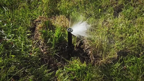 Sprinkler system. Automatic sprinkler sp... | Stock Video | Pond5