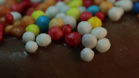 Sprinkles Melt Off of Chocolate MACRO Stock Footage 75749085