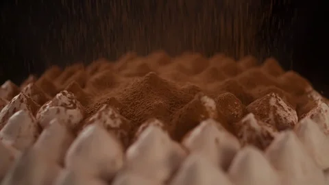Sprinkling cake with chocolate Extremely Close up Macro Stock Footage 103256305