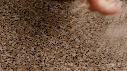 Sprinkling of flour for preparing dough 4K Stock Footage 96329948