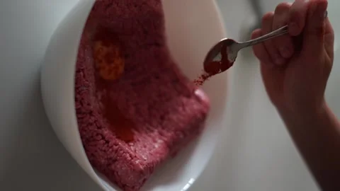 Sprinkling meat with red pepper Video stock 244859059