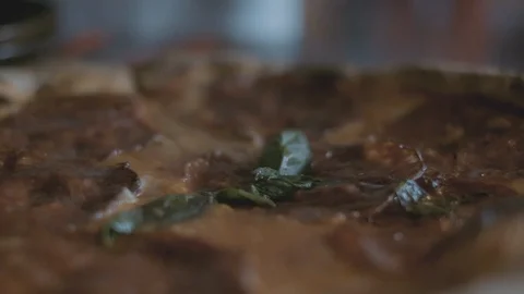 Sprinkling Parmesan on Pizza Stock Footage 128813270