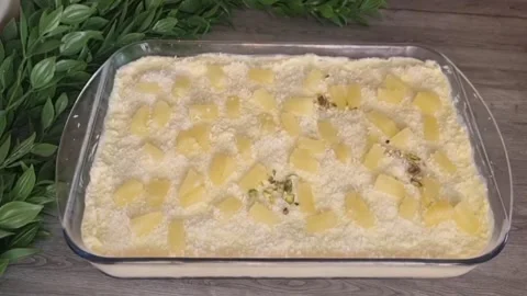 Sprinkling Pistachios on No-Bake Pineapple Cake Dessert - HD Stock Footage Stock Footage 343877685