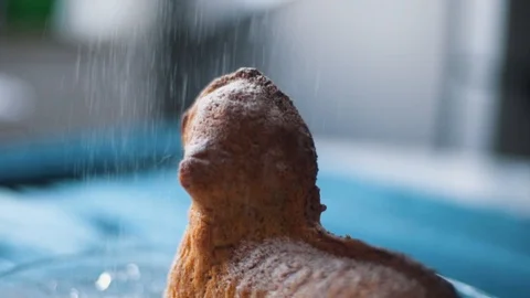 Sprinkling Sugar on Traditional Easter Pastry Stock Footage 87835294
