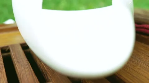Sprinkling of tea into bowl Video stock 67994769