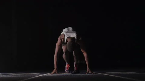 Sprinter Exiting His Starting Blocks 스톡 동영상 208743356