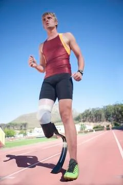 Sprinter standing with prosthetic leg on Stock Photos