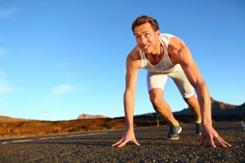 Sprinter starting sprint - man running Stock Photos