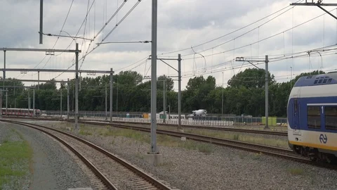 Sprinter train with passengers passing 스톡 동영상 110018002