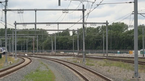 Sprinter train with passengers passing Stockbeeldmateriaal 110018208