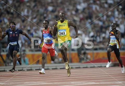 Sprinter Usain Bolt Of Jamaica Pictured Winning The Gold And Setting A ...