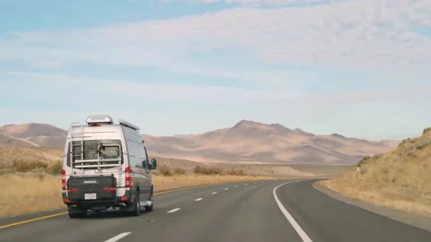 Sprinter Van driving route 395 California on beautiful day Stock Footage 167138547
