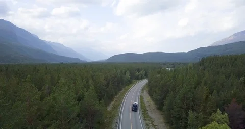Sprinter Van driving through norwegian forest Stock-Footage 120190312