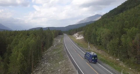 Sprinter Van driving through norwegian forest Stock-Footage 120190358
