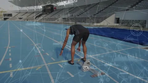 Sprinter walking blocks, stepping into crouch while sports HUD tracking watch, Video stock 332275407