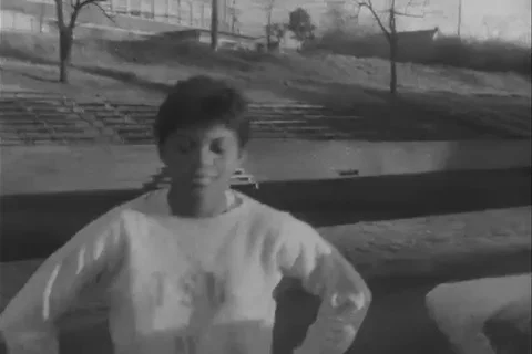 Sprinter Wilma Rudolph and her teammates train in the ground - 1961 Stock Footage 106183903