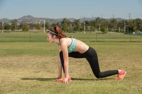 Sprints on grass Stock Photos