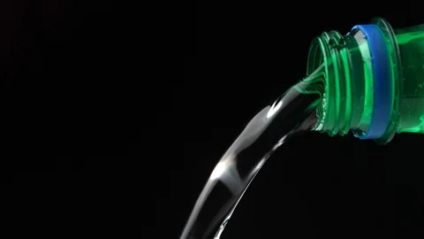 Sprite poured from the neck of a plastic bottle Stock Footage 110460691