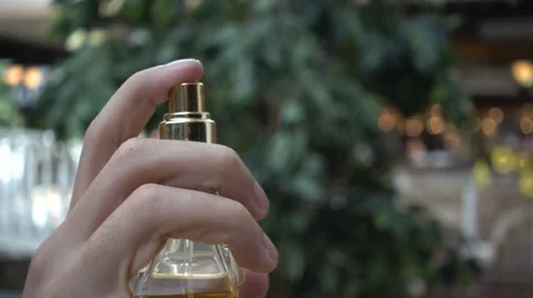 Spritzing of Perfume in the Air Stock Footage