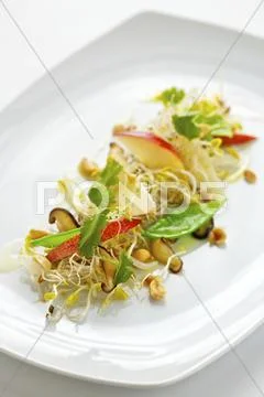 Sprout, mangetout and apple salad Stock Photos