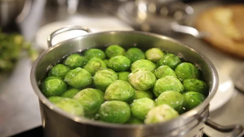 Sprout preparation, boiling action, kitchen routine Stock Footage 287621650