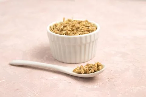 Sprouted wheat on a light background. toned Stock Photos