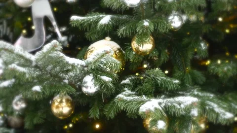 Spruce branches with snow on it and Christmas toys in New Year Stock Footage 139850080