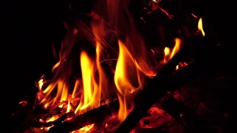 Spurts of flame. Campfire in the night. Slow motion Stock Footage