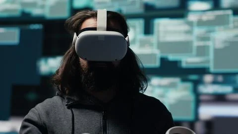 Spy bypasses network security and engages in cyber intrusion with vr glasses 스톡 사진