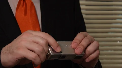 Spy camera in the hands of a spy who removes secret documents, collecting Video stock 126114652