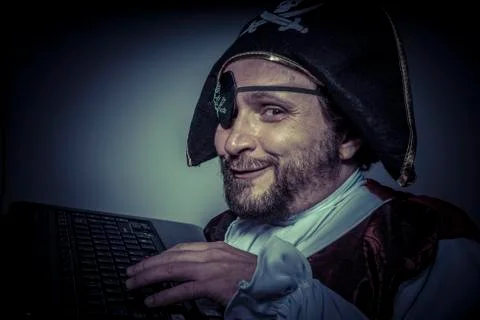 Spy, computer security, hacker pirate dress with hat and skull Stock Photos