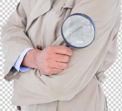 Spy looking through magnifier Stock Photos