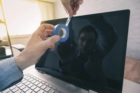 Spying on individuals through computer camera. CIA or the NSA monitors its .. Foto stock