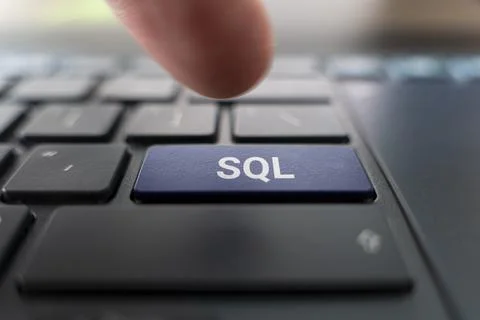 Sql text created with keyboard keys, computer terminology, black keyboard Stock Photos