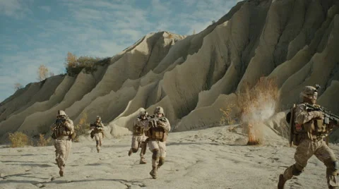 Squad of Fully Equipped, Armed Soldiers Running and Attacking During Combat in t Stock Footage 68968299