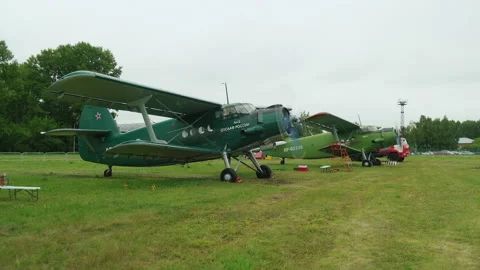 Squadron of Light Aircraft Preparing for Departure. Competitions. Paragliding Stock Footage 196202847