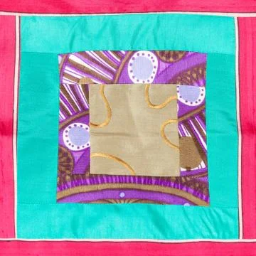 Square applique of patchwork cloth Stock Photos