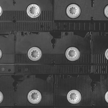 Square background from VHS cassettes. Stock Photos