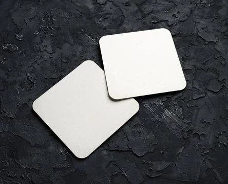 Square beer coasters Stock Photos