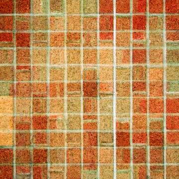A square brick tile background made from red, brown, and tan square bricks. Illustrazione stock