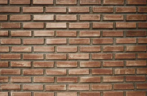 A square brown brick wall interior background sets the scene for the show. Stock Photos