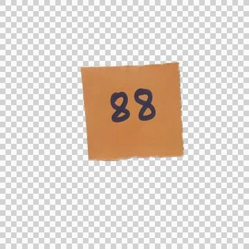 Square brown paper note with the number eighty eight written in black ink Фото