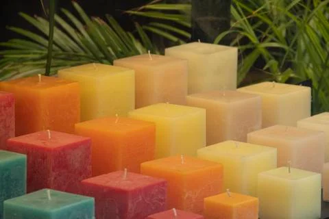Square candles of different colors Photos